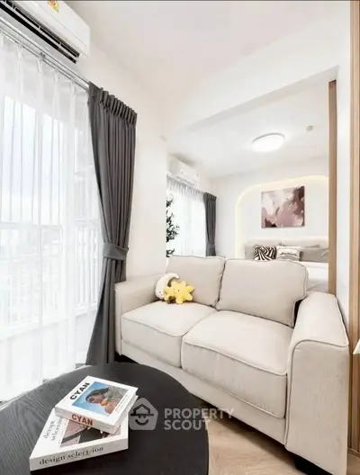 Modern living room with cozy sofa and stylish decor in a bright apartment