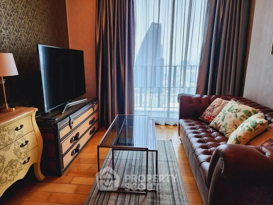 Luxurious living room with leather sofa, vintage decor, and large TV, offering a cozy and elegant ambiance.