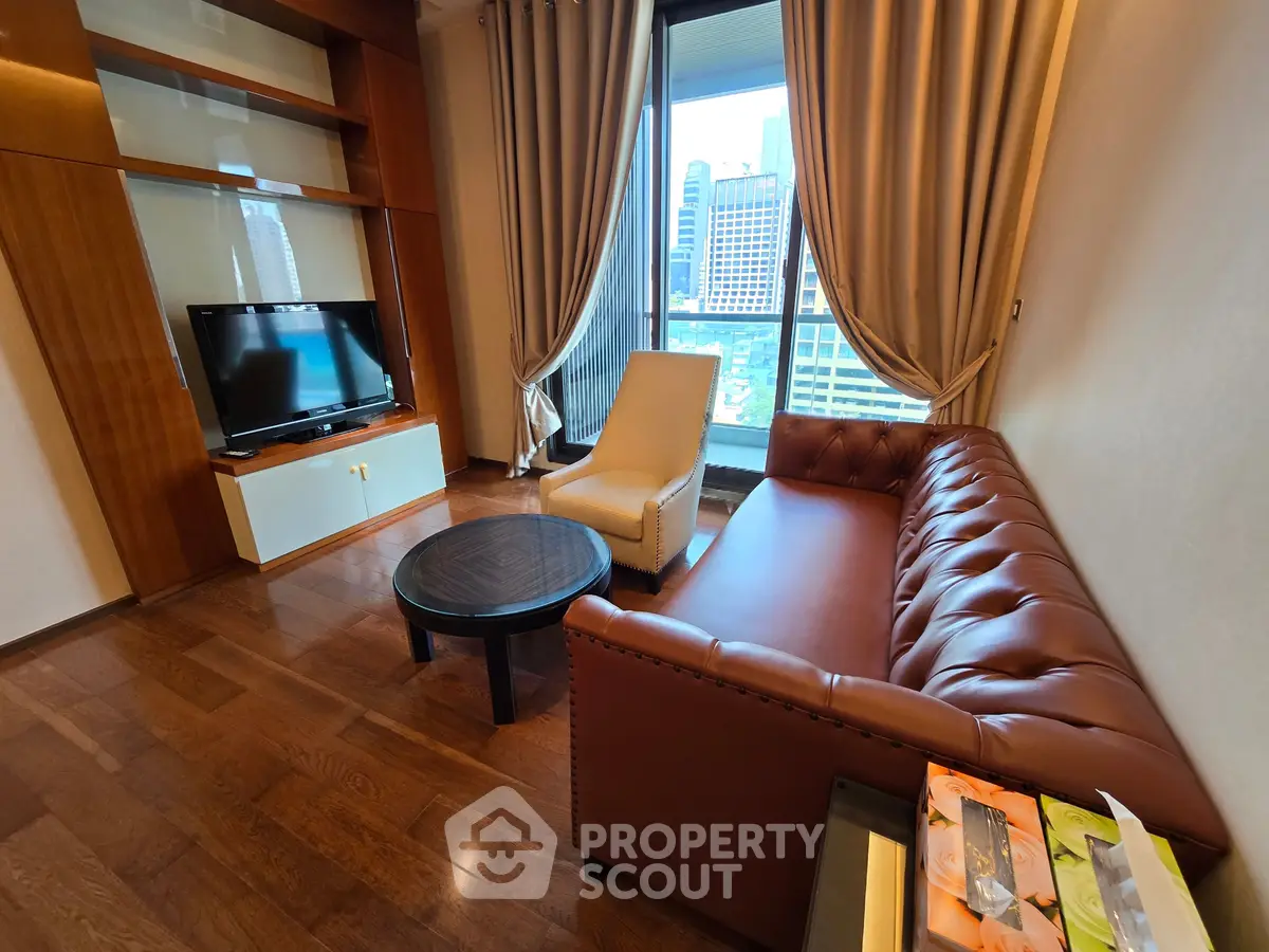 Luxurious living room with leather sofa and city view, perfect for urban living.