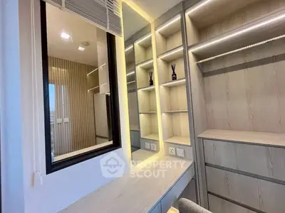 Modern study area with built-in shelves and desk in stylish apartment