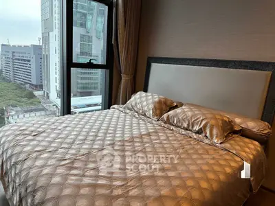 Luxurious bedroom with city view and elegant bedding in modern apartment