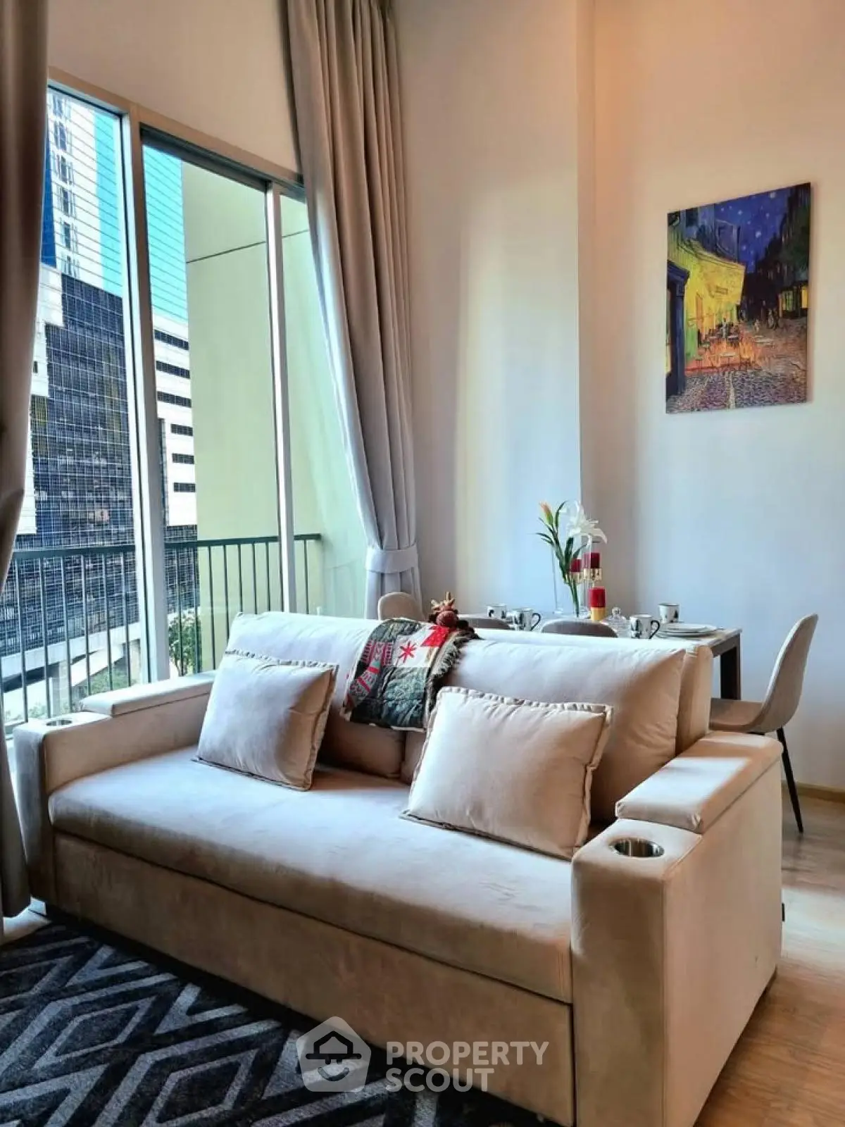 Chic living room with cozy sofa and dining area, modern urban view.