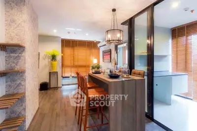 Modern kitchen with open layout and stylish dining area