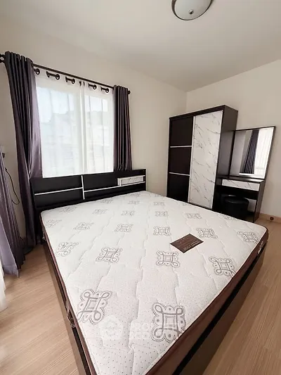 Modern bedroom with stylish furniture and natural light