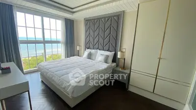 Luxurious bedroom with ocean view and elegant decor