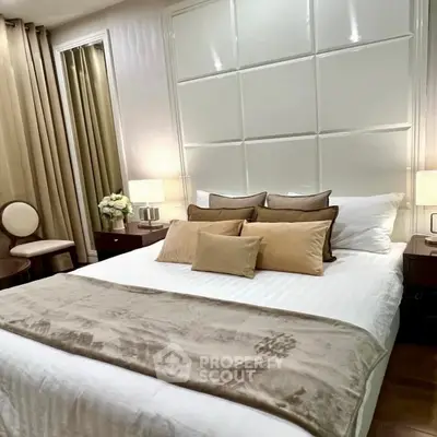 Luxurious bedroom with elegant decor and plush bedding in modern apartment