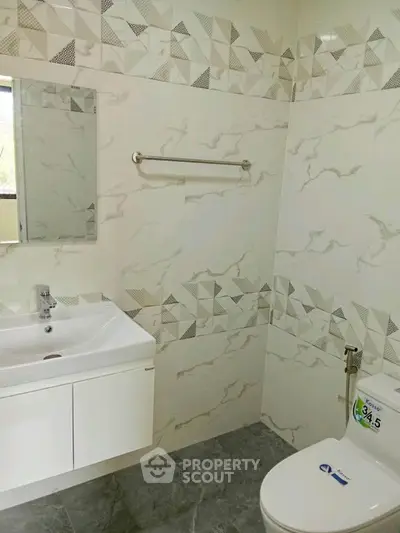 Modern bathroom with stylish tiles and sleek fixtures