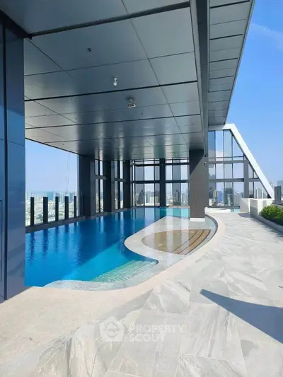 Luxurious rooftop pool with stunning city views and modern architecture.