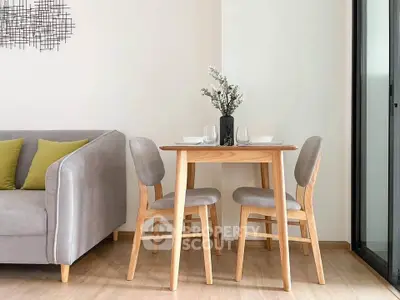 Modern living room with cozy dining area and stylish decor