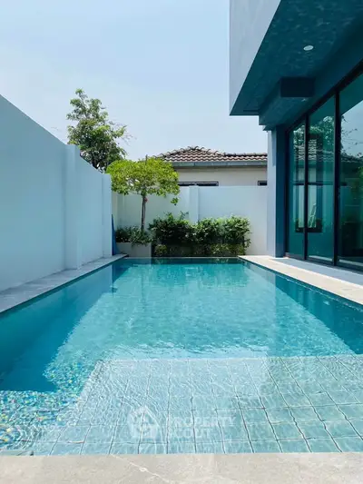 Luxurious private pool area with modern design and serene ambiance, perfect for relaxation and entertainment.