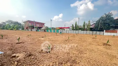 Expansive land plot with development potential in a serene neighborhood.