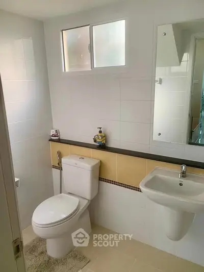 Modern bathroom with sleek fixtures and natural light