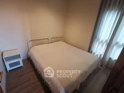 Cozy bedroom with minimalist decor and natural light