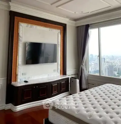 Luxurious bedroom with city view, featuring elegant decor and large window for natural light.