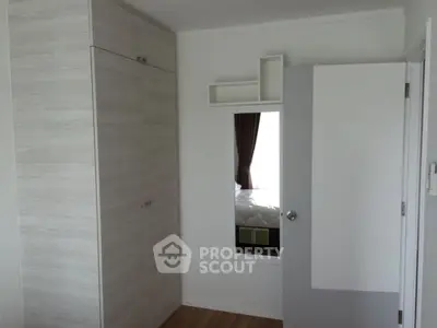 Modern bedroom with built-in wardrobe and stylish decor