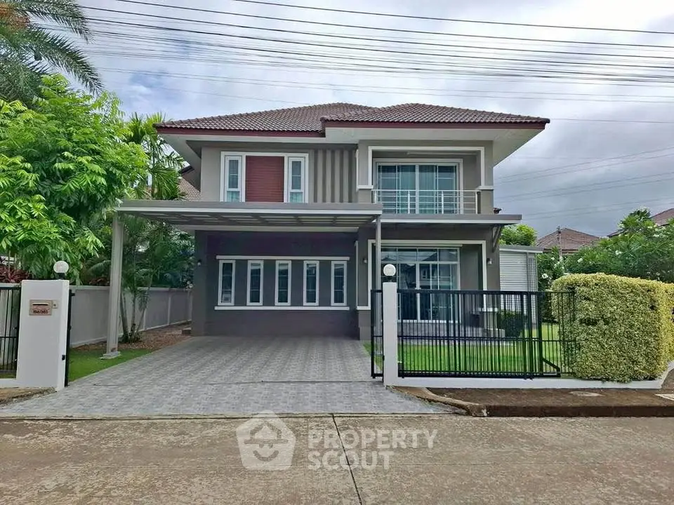 Stunning two-story modern house with spacious driveway and lush garden