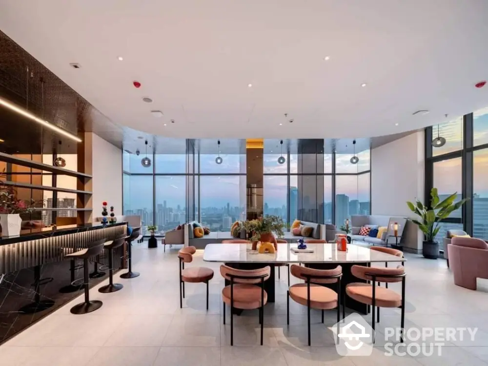 Luxurious high-rise apartment living room with panoramic city views, modern furniture, and elegant interior design.