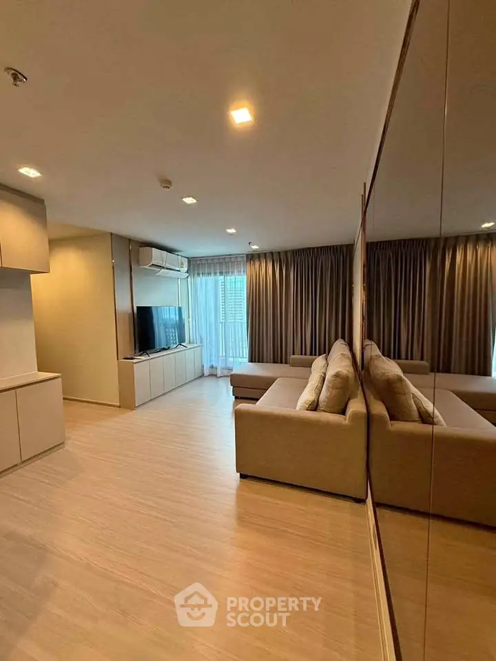 Spacious modern living room with elegant decor and natural light