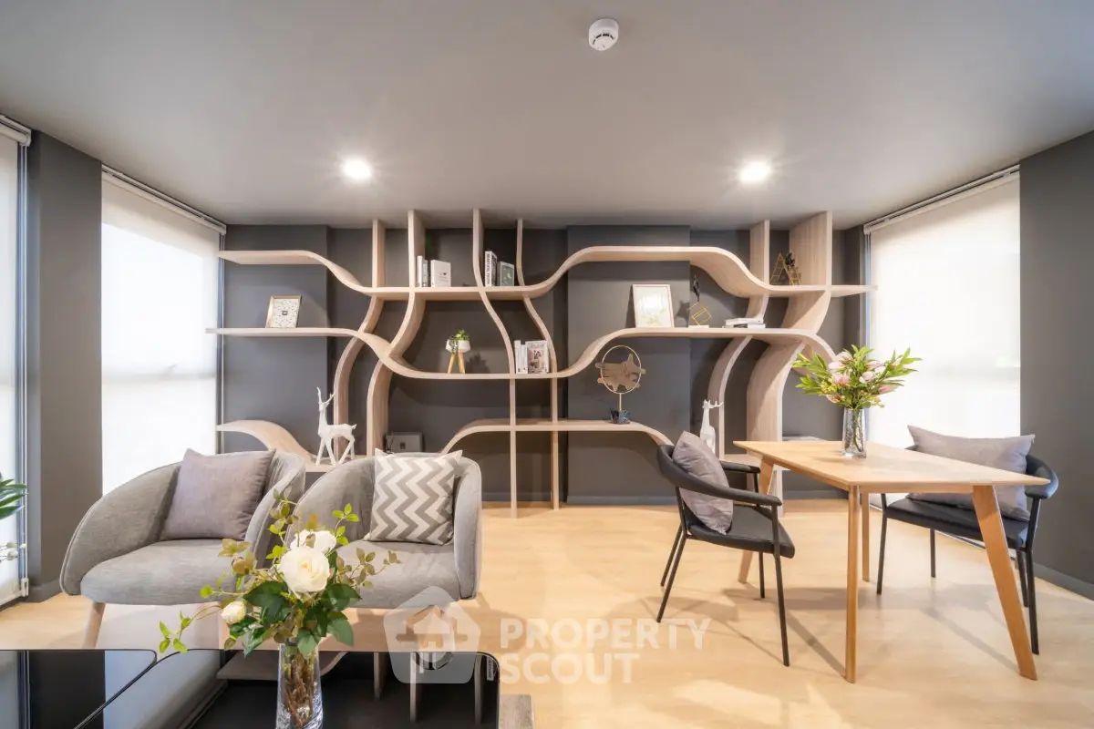 Modern living room with unique shelving and stylish furniture