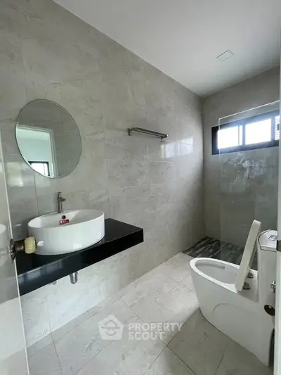 Modern bathroom with sleek fixtures and natural light