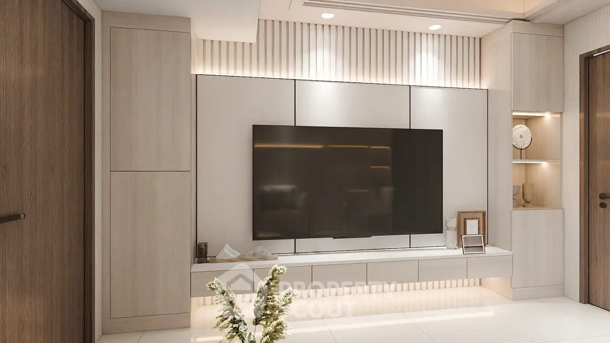 Modern living room with sleek TV setup and elegant lighting