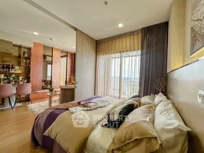 Luxurious bedroom with elegant decor and stunning city view from large window.