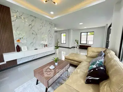 Spacious modern living room with elegant decor and large sofa