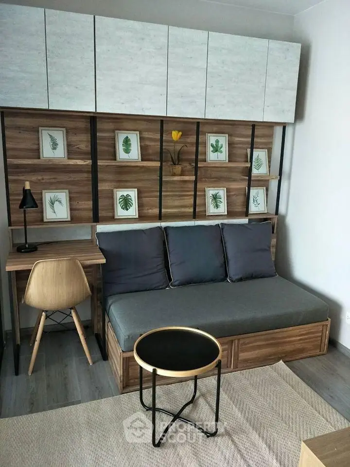 Modern living room with stylish decor and functional furniture, perfect for urban living.