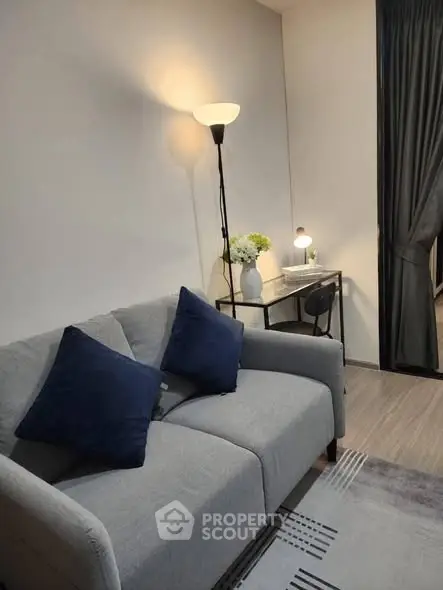 Cozy living room with gray sofa and modern decor