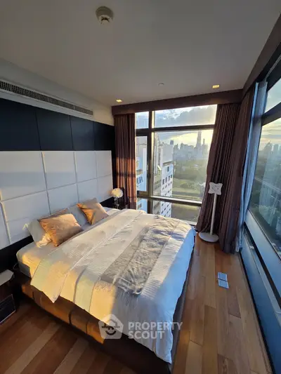 Luxurious bedroom with stunning city view and modern decor