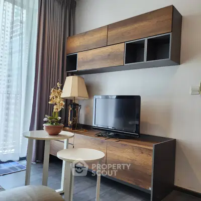 Modern living room with stylish wooden TV cabinet and cozy decor