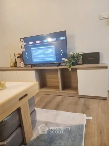 Modern living room with stylish TV stand and decor