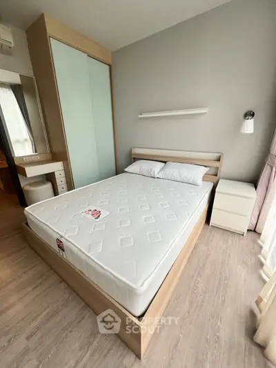 Modern bedroom with stylish bed and natural light