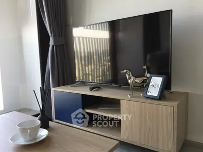 Modern living room with sleek TV setup and stylish decor