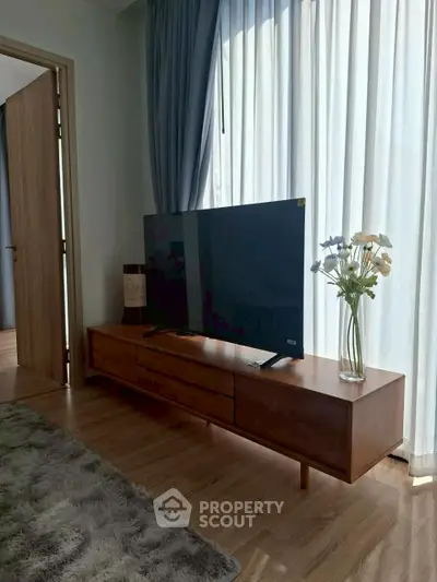 Modern living room with sleek TV stand and elegant decor