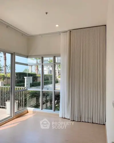 Bright corner unit with large windows and garden view, perfect for natural light lovers.