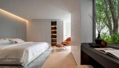 Luxurious modern bedroom with elegant decor and large window view