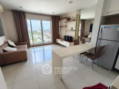 Modern living room with city view, sleek furniture, and open layout for stylish urban living.