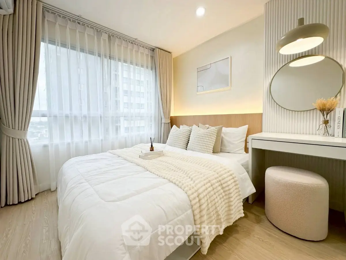 Cozy modern bedroom with elegant decor and natural light