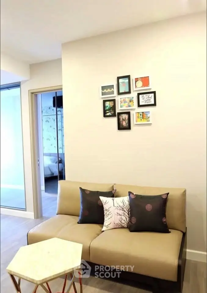 Stylish living room with modern decor and cozy seating in a contemporary apartment.