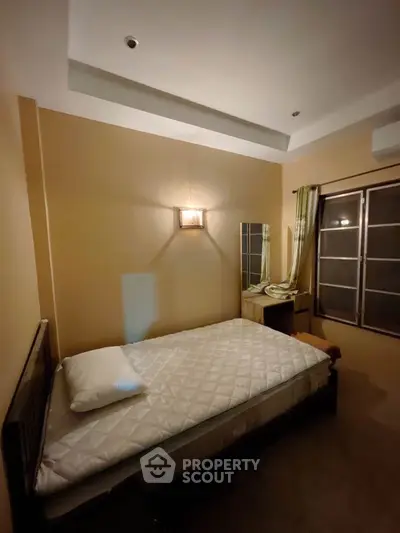 Cozy bedroom with minimalist decor and natural light
