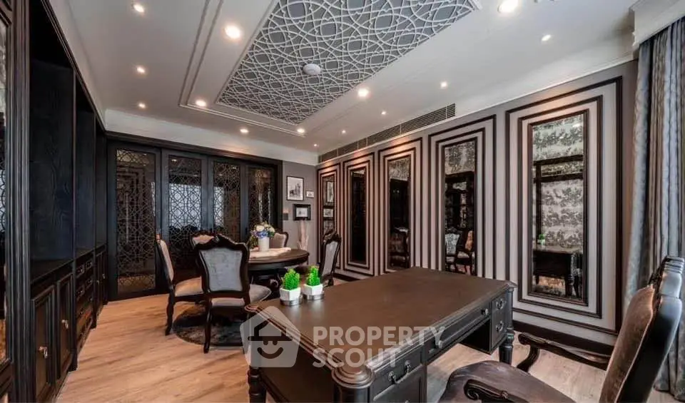 Luxurious study room with elegant decor and intricate ceiling design