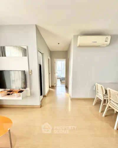 Bright and modern apartment interior with open layout and stylish furnishings
