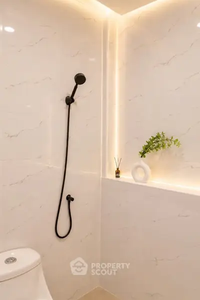 Modern bathroom with elegant shower and ambient lighting