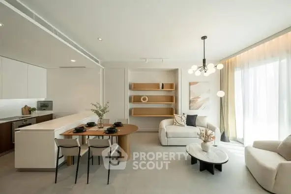 Modern open-layout living room with stylish dining area and natural light