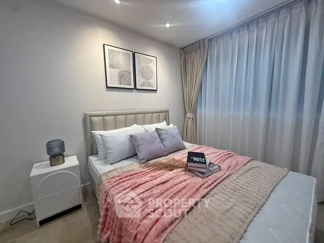 Cozy bedroom with stylish decor and soft lighting