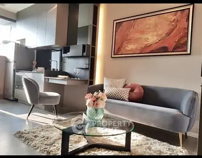 Stylish modern living room with elegant decor and cozy seating area.