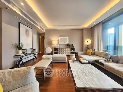 Luxurious modern living room with elegant decor and ambient lighting