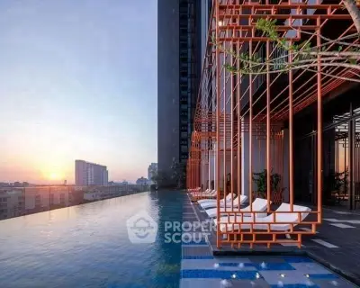 Luxurious rooftop pool with stunning city skyline view at sunset, perfect for relaxation and leisure.