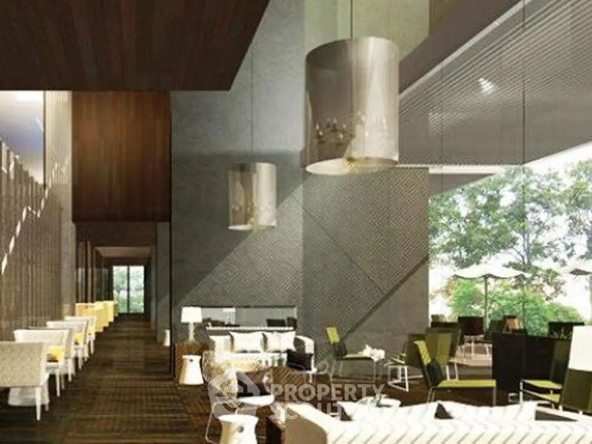 Luxurious modern living room with elegant decor and large windows offering a stunning view.